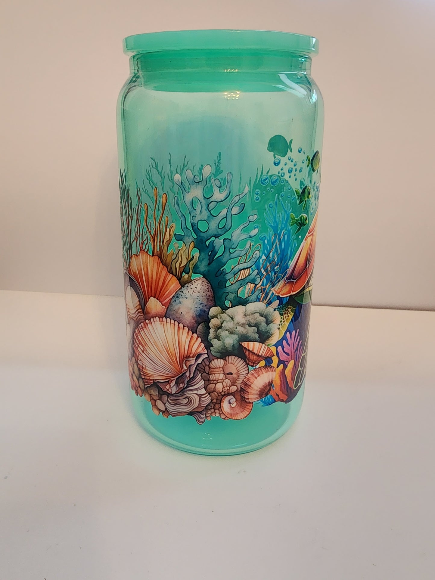 Teal turtle glass cup.